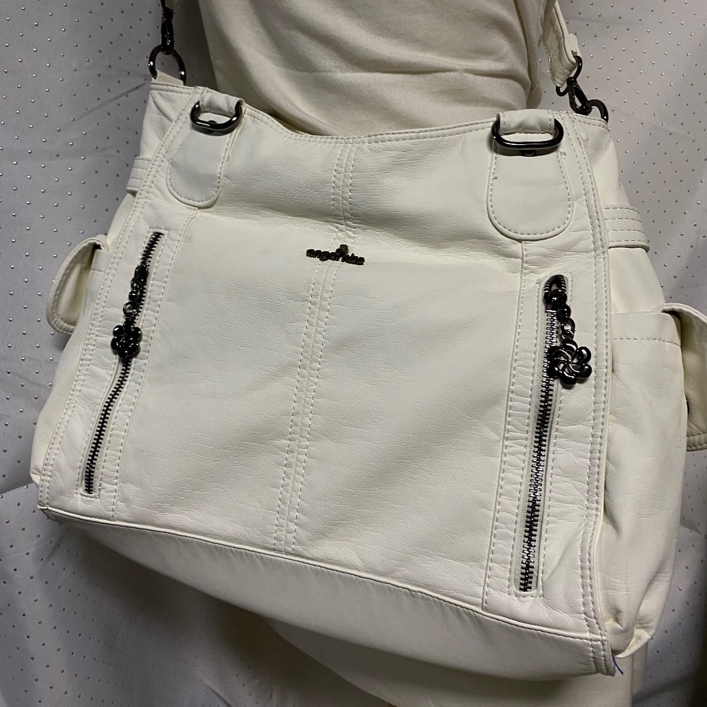 Angle kiss bag soft leather with  insert off white purse nwot